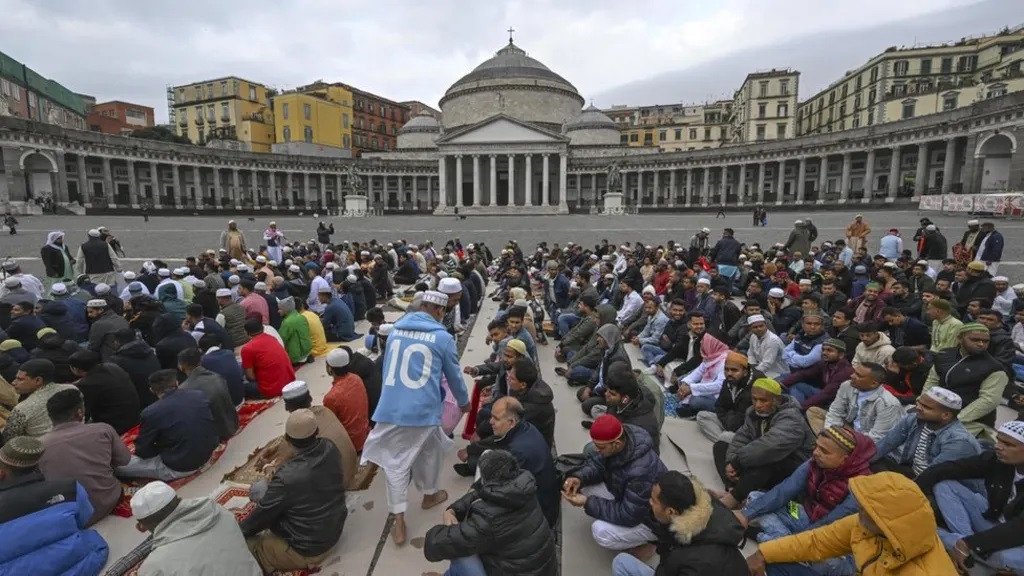 Worshippers gathered in Naples, Italy.