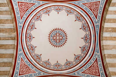 ornamental ceiling with colorful oriental mural in mosque