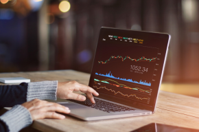 businessman using laptop to analyze data