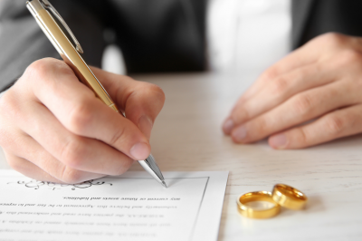 person signing marriage contract