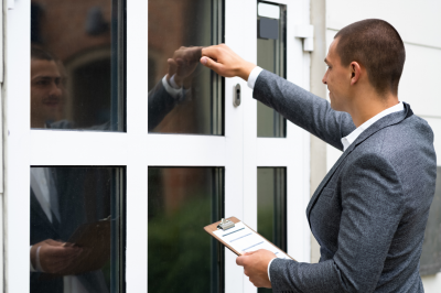 debt collector knocking door