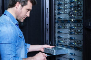 it technician installing server-