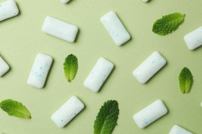 chewing gum and mint on green background-Can You Chew Gum during Ramadan