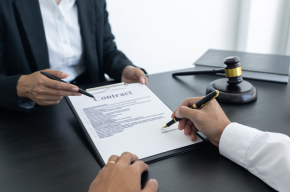 client and lawyer discussing a deal