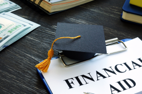 Graduation cap and financial aid for student form