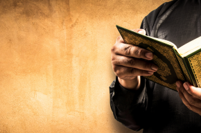 Quran in hand