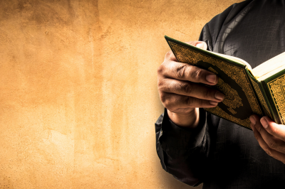 Quran in hand
