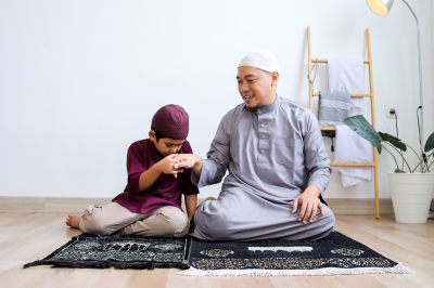 child kissing father's hands