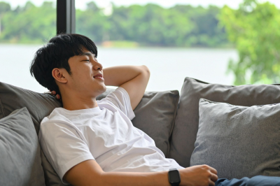 man-relaxing-on-couch